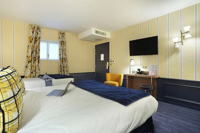 غرفة ثلاثية، Auberge Du Cheval Blanc 1/2