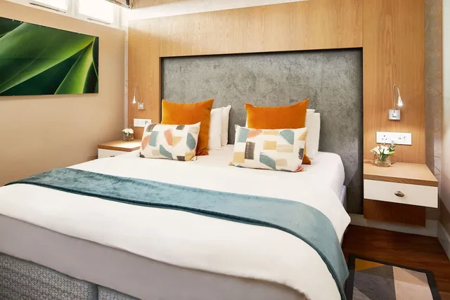 شقة بسرير كينج وسرير كوين بإطلالة على الحديقة بغرفتي نوم، Breakers Resort 2/4
