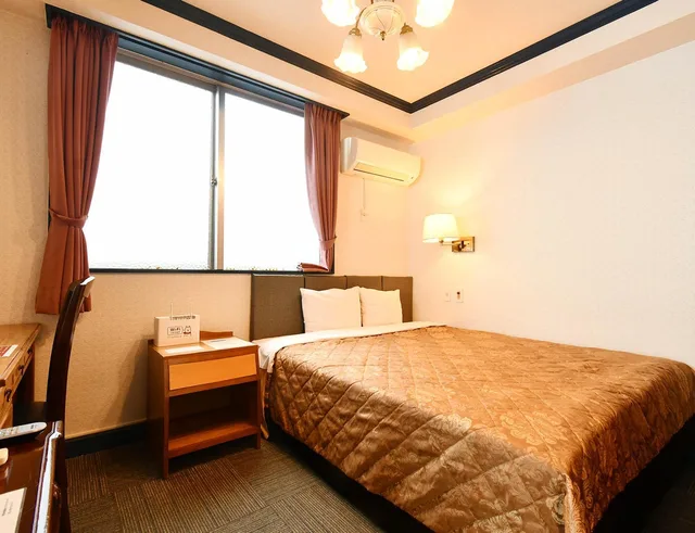 غرفة بسرير كوين، Sunrise Hotel 1/8