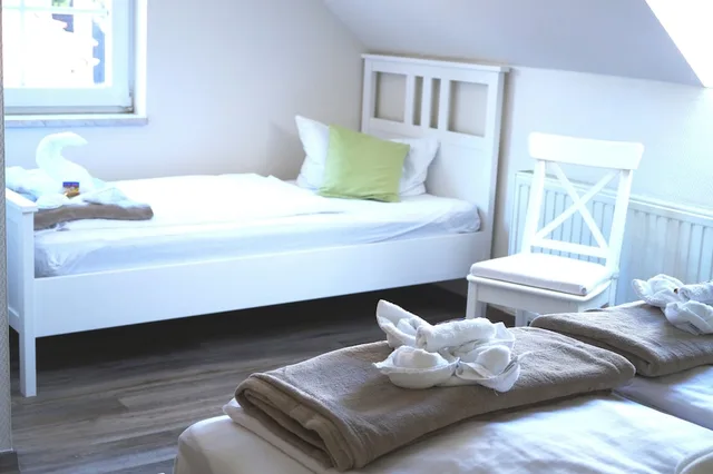 غرفة ثلاثية مفردة بسرير فردي، REGIOHOTEL Pfalzer Hof Wernigerode 1/3