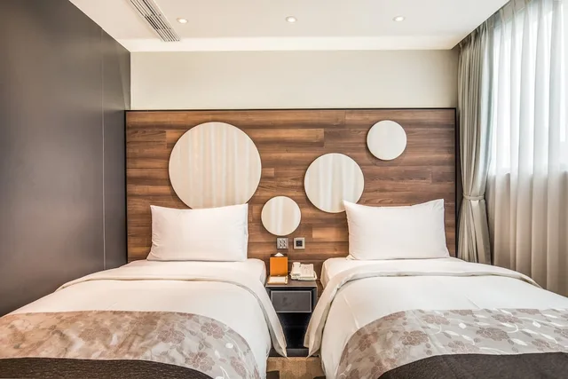غرفة ديلوكس بسريرين منفصلين بإطلالة على المدينة بشرفة، Green World Hotel Songshan 3/7