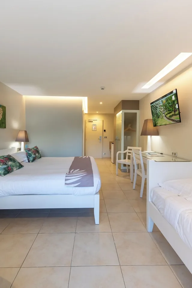 غرفة كومفورت ثلاثية بثلاثة أسرّة بإطلالة على الحديقة، La Pagerie Tropical Garden Hotel 2/7