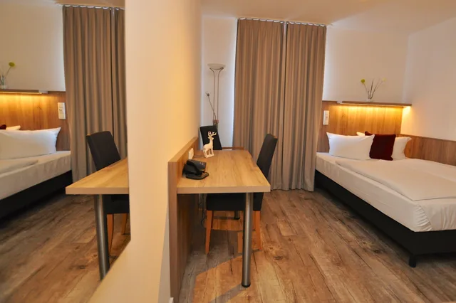 غرفة بسرير كوين، GOLDEN LEAF PERLACH ALLEE HOF 7/10