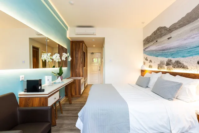 جناح جونيور بحوض جاكوزي، Atrium Ambiance Hotel 2/7
