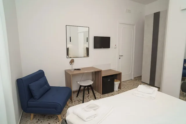 غرفة كومفورت ثلاثية بسرير كوين وسرير فردي في الطابق الأرضي، B&B Il Geranio 9/10
