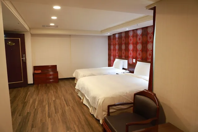 غرفة ديلوكس ثلاثية بسرير مزدوج وسرير فردي، Chuanfu Hotel 2/2