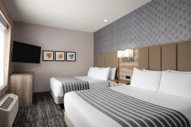 غرفة عائلية بسريرين كوين، Best Western Premier Executive Residency Medicine Hat 1/2