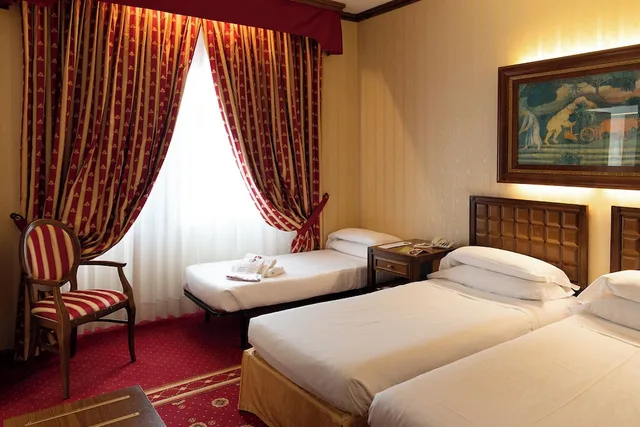 غرفة ديلوكس ثلاثية بسريرين منفصلين، GRAND HOTEL TRENTO 2/6