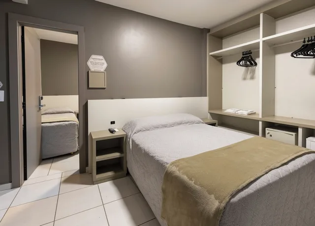 Superior, Quintuple, 1 Single and 2 Double Beds، Palmas Executivo Hotel 1/8
