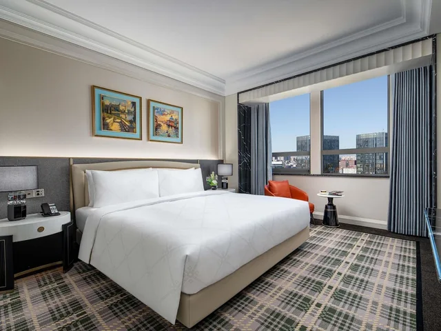 جناح ديلوكس بسرير كينج بمنطقة جلوس مع دخول الصالة في طابق مرتفع، PULLMAN BEIJING SOUTH 2/10