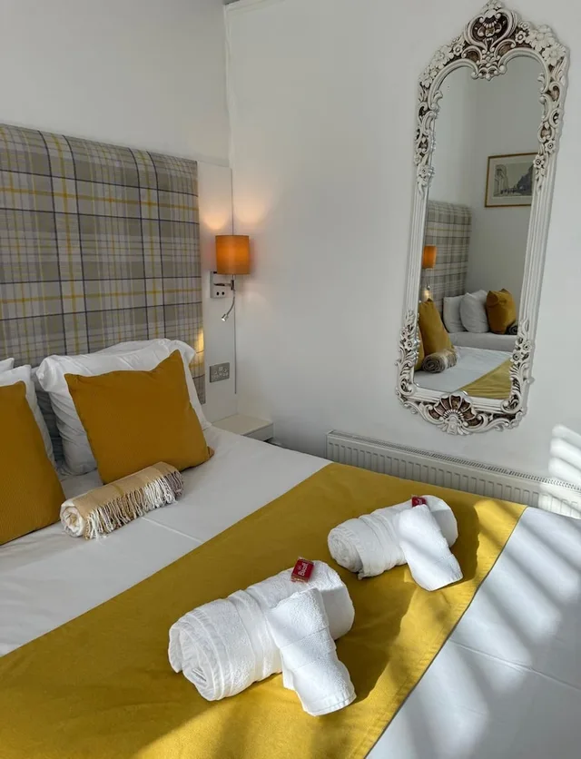 Deluxe, Quadruple, 1 Single and 2 Double Beds، The International Guest House 4/10