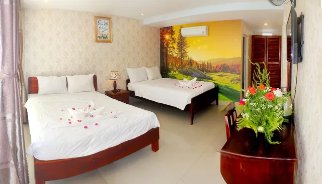غرفة عائلية بسريرين مزدوجين بإطلالة على الحديقة، Hai Yen Resort 5/10