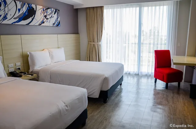 غرفة بريميير بسريرين منفصلين بإطلالة على الحديقة، Solea Mactan Resort 3/8