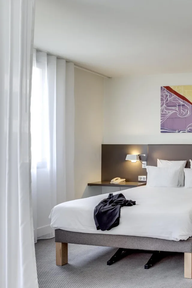 جناح سوبيريور بسرير مزدوج وسرير فردي مع أريكة، Novotel Suites Paris Stade De France 3/10