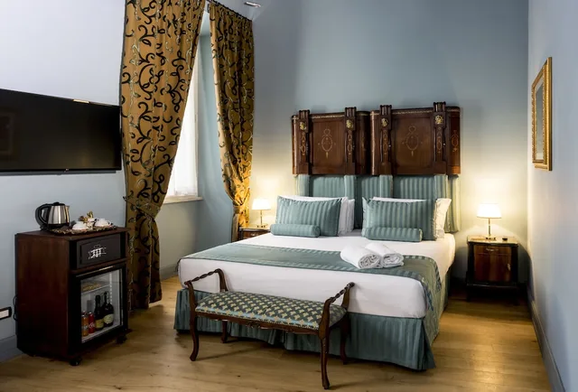جناح ديلوكس بسرير كوين، Navona Grand Suite 1/2