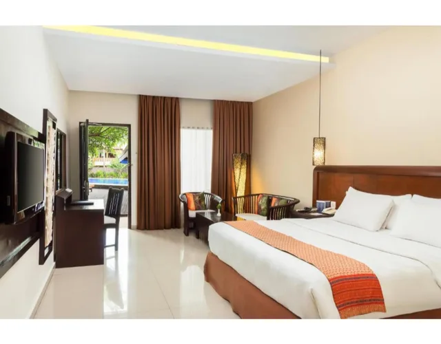 غرفة ديلوكس بسرير كينج بإطلالة على المسبح، Best Western Resort Kuta 1/3