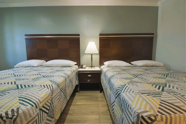 Standard, 2 Queen Beds, Smoking, Welcome Inn 1/2