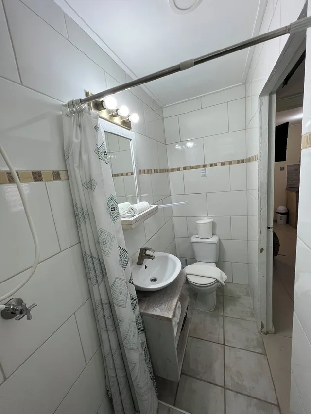 Room, Queen Bed, Kitchenette, Mustique Suites Curacao 4/5