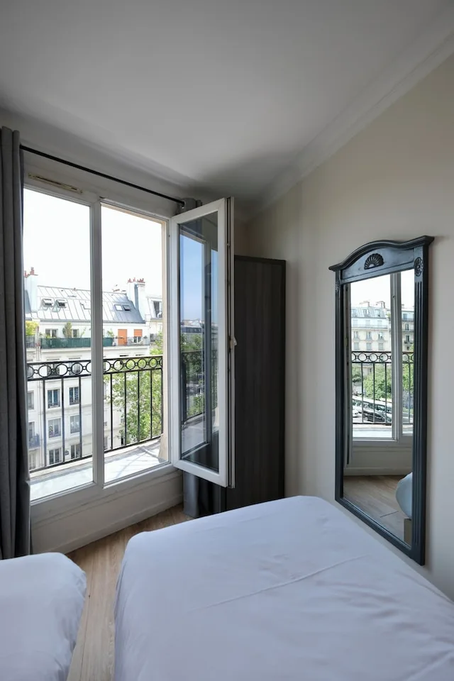 غرفة بسريرين منفصلين، Hipotel Paris Voltaire Bastille 1/10