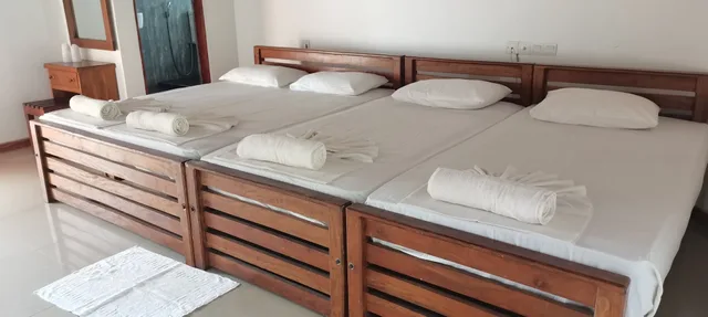 غرفة عائلية رباعية بسرير مزدوج وسريرين منفصلين، Rajarata Lodge 1/3