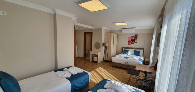 استوديو عائلي بسرير كينج وسريرين منفصلين في الملحق، Sur Hotel 2/2