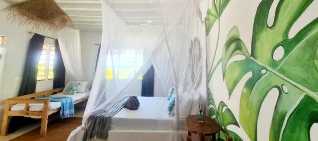 غرفة ديلوكس بسرير مزدوج مع سرير إضافي، Garden Beach Bungalows 7/10