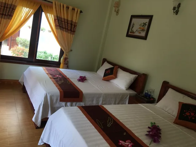 غرفة عائلية بسرير كوين وسرير فردي بشرفة، Tam Coc Tuan Minh Homestay 10/10