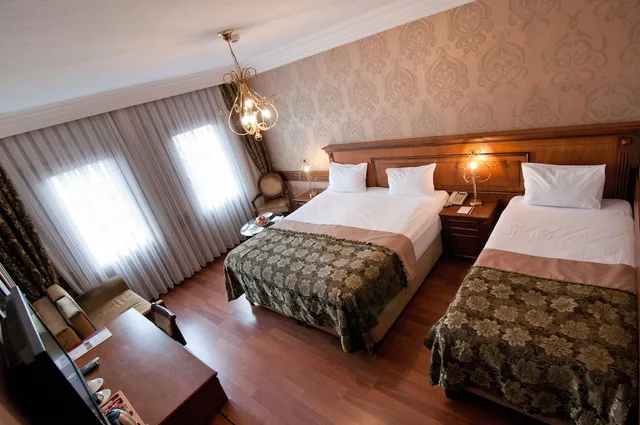 غرفة عائلية بسرير كينج وسرير فردي بإطلالة على المدينة مع أريكة، FERMAN HOTEL 3/11