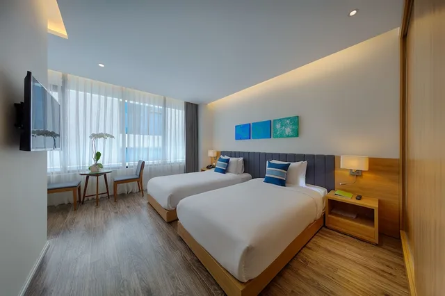 غرفة ديلوكس بسريرين منفصلين، Parosand Danang Hotel 1/6