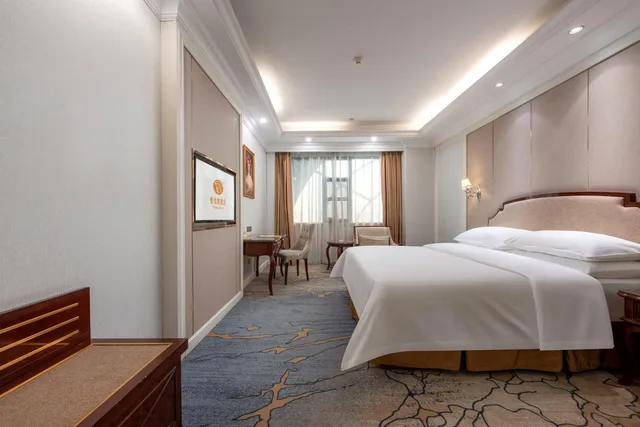 غرفة ديلوكس بسرير كوين، Vienna Hotel (Guangzhou Baiyun University Jinyuan Plaza) 1/2