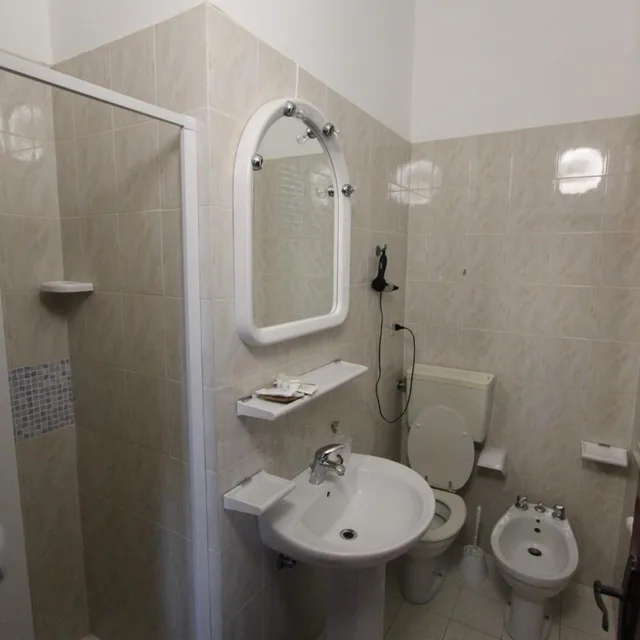 غرفة ثلاثية، Hotel La Scogliera 4/7