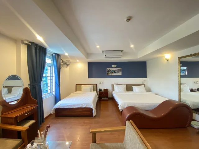 غرفة ديلوكس عائلية بسرير كوين وسرير فردي، A25 Hotel - No. 137 Nguyen Du 2/10