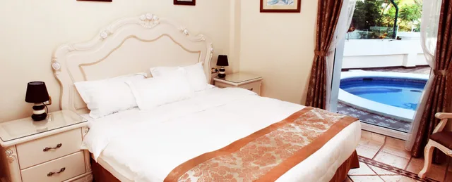 جناح ديلوكس بسريرين كينج بغرفتي نوم بمسبح خاص، Flamingo Suites 4/9