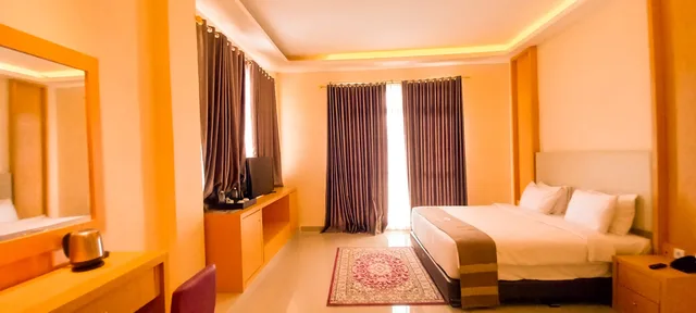 غرفة غراند ديلوكس بسرير كوين، Portola Grand Renggali Hotel 1/2