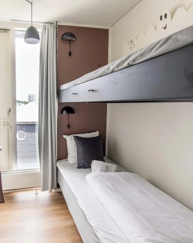 شقة بأربعة أسرّة وسرير مزدوج وسرير بطابقين بإطلالة على الفناء بغرفتي نوم، Kolding Hotel Apartments 2/8
