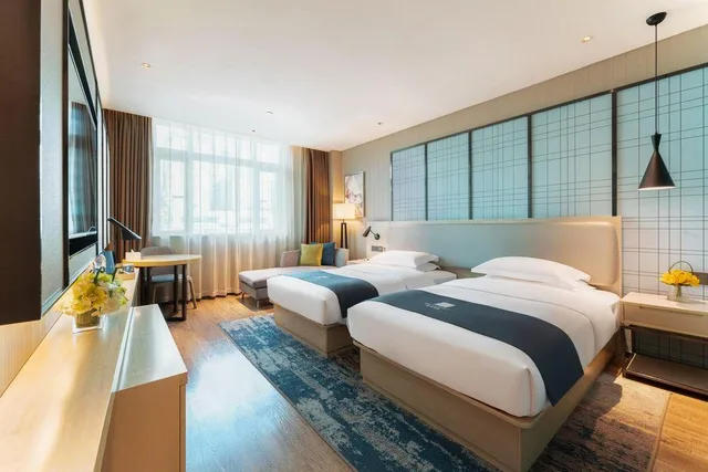 غرفة ديلوكس بسريرين منفصلين، Echarm Hotel( Guangzhou Shiqiao Metro Station Zuanhui Square) 1/2