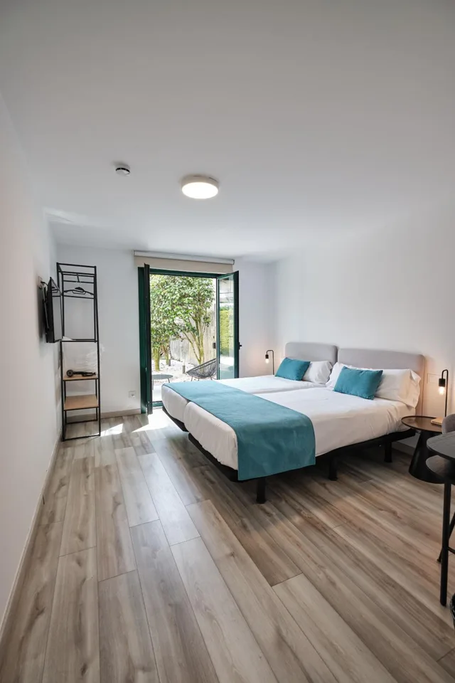 غرفة بسرير مزدوج أو سريرين منفصلين، Pombal Rooms Santiago 2/10