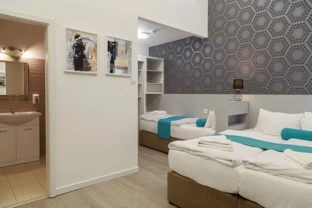 غرفة ديلوكس ثلاثية بثلاثة أسرّة، Hotel Mika Downtown 5/7