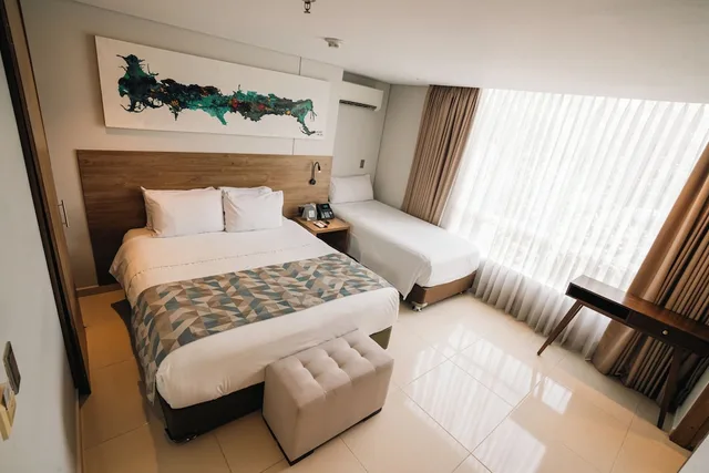 غرفة قياسية بسرير مزدوج وسرير فردي، Hotel Ambar Boutique 4/10