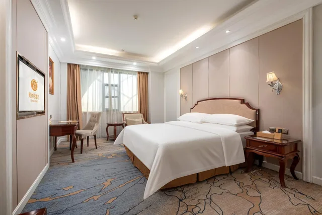 غرفة ديلوكس بسرير كوين، Vienna Hotel (Guangzhou Baiyun University Jinyuan Plaza) 2/2