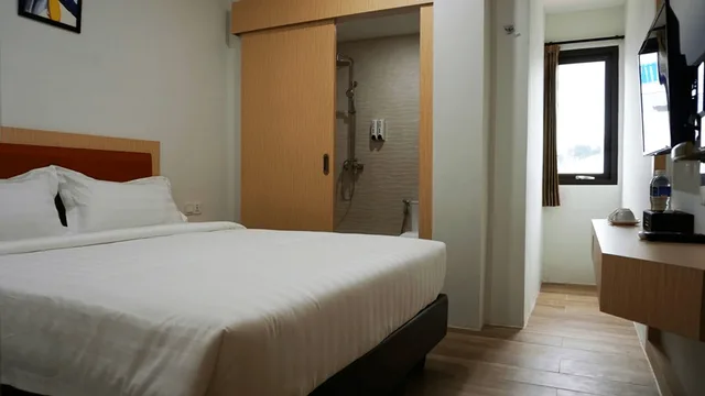 غرفة ديلوكس بسرير مزدوج، Sovrano Hotel Batam (ex Parkside Sovrano Hotel Batam) 2/4