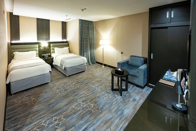 غرفة ديلوكس بسريرين منفصلين بإطلالة على المدينة بغرفة نوم واحدة، فندق سماء إن(Sama Inn Hotel Apartments) 2/4
