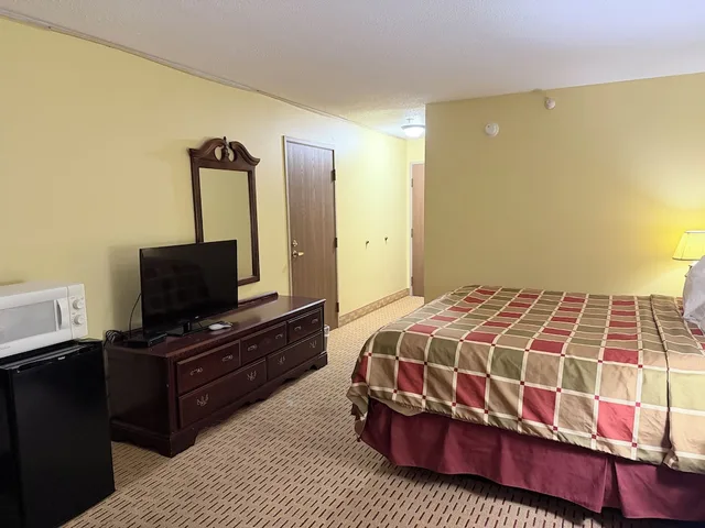 غرفة بسرير كينج، American Heritage Inn 1/5