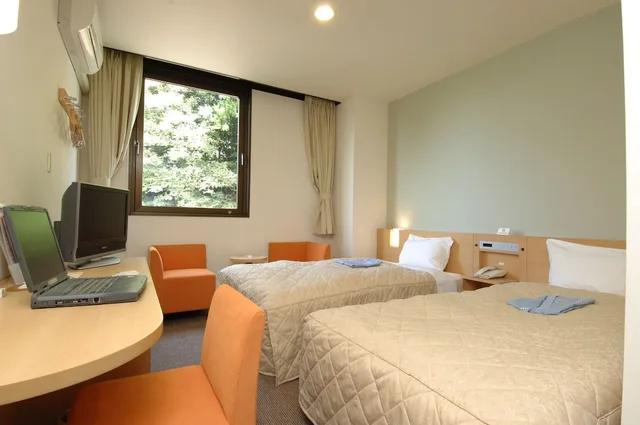 غرفة بسريرين منفصلين للمدخنين، Hamada New Castle Hotel 1/2