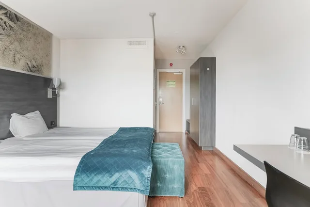 غرفة قياسية بسريرين منفصلين مع أريكة، QUALITY HOTEL SUNDSVALL 1/10