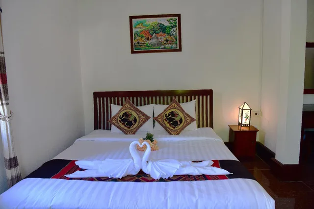 غرفة ديلوكس بسرير مزدوج بشرفة، Thatsaphone Hotel 2/3