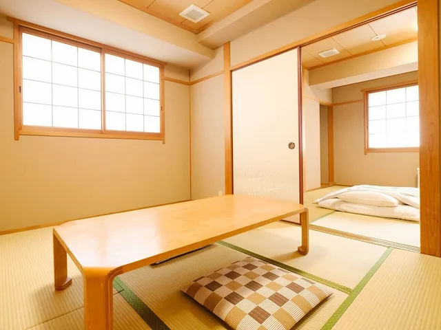 غرفة يابانية بفرشتي فوتون بأرضية تاتامي، Matsuyama New Grand Hotel 9/10