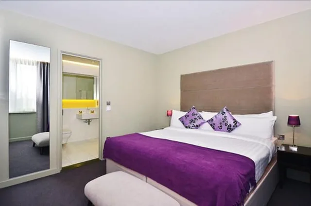 استوديو ثلاثي بسرير مزدوج وسرير فردي، Axiom Park Hotel 1/4
