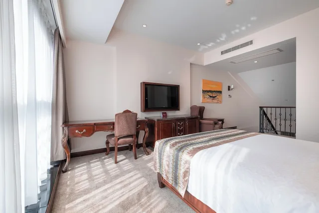 دوبلكس عائلي بسرير مزدوج وسرير فردي، Tang Palace Hotel 1/8