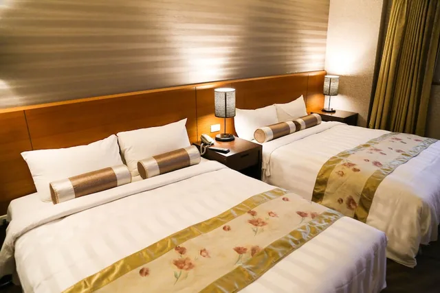 غرفة قياسية رباعية بسريرين مزدوجين، Unique Holiday Hotel 2/3